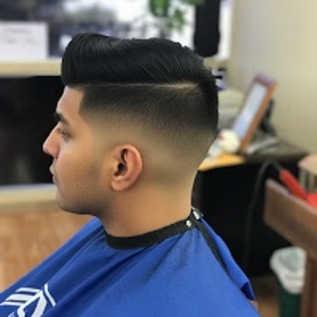 Classic pompadour with mid skin fade and beard
