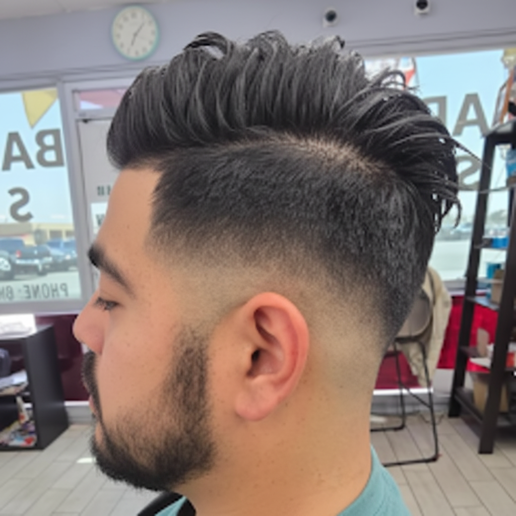 Tall textured brush-up with low taper fade and beard